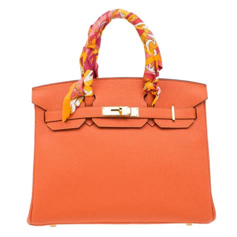 hermes orange purse with fabric on handle|hermes orange handbags.